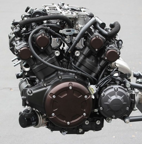 Why are V4 engines so uncommon in cars?